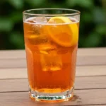 Refreshing Spaghett cocktail in a glass with lemon and ice