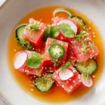 Hamachi crudo with cucumber, serrano, radish, and citrus dressing